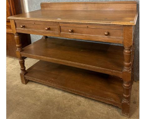 A late Victorian Liberty &amp; Co. oak three tier buffet sideboard 
