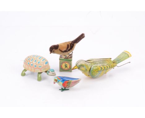 Tin Toy Birds and Huntley and Palmers Sample Biscuit Tin, Kohler clockwork tweeting song bird in green and yellow, tested ok 