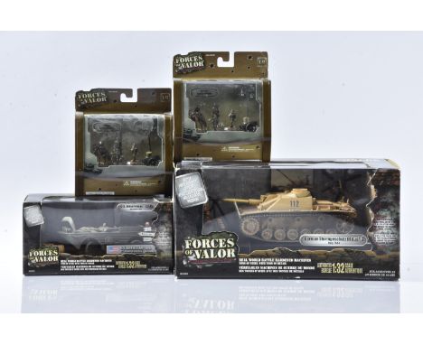 Forces of Valor, a boxed group of WWII models, 1:32 scale 81006 German Sturmgeshutz tank Italy 1944 and 82004 US amphibian GP