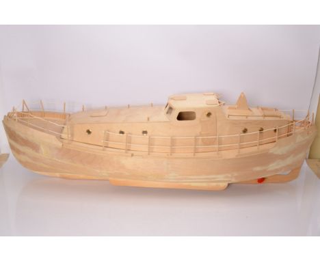 Four kitbuilt unfinished medium to very large boats,  very large Cabin Cruiser with stringed railings and twin drive shafts, 