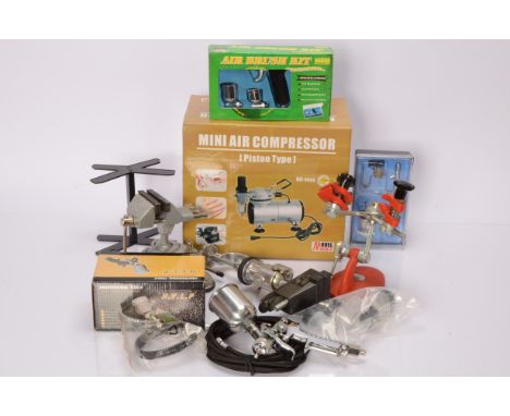 Collection of vices and paint compressors used for model boat kit building and painting, including, ROHS Mini Compressor AS18