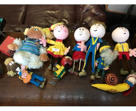 A collection of handmade 'The Magic Roundabout' characters, together with a Womble bear 