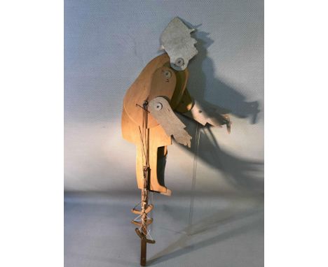 A male caricature wooden shadow puppet, c1900's 