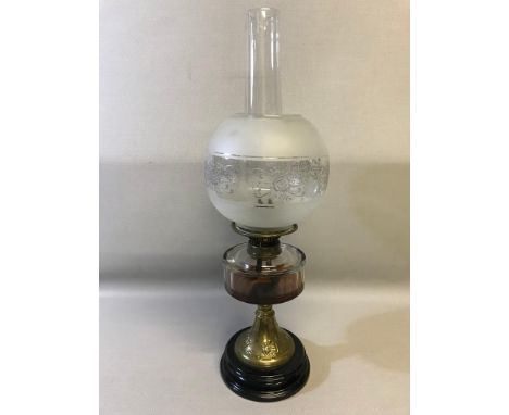 Art Nouveau brass and glass paraffin lamp with ornate globe shade 