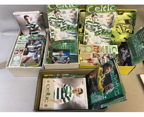 4 Shoe boxes full of Celtic football club programmes 