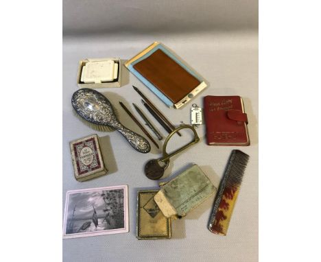 A Collection of odds which includes silver brush and comb, Vintage playing cards & various fountain pens, one has a 14kt gold