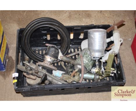 A box containing various compressor tools etc.
