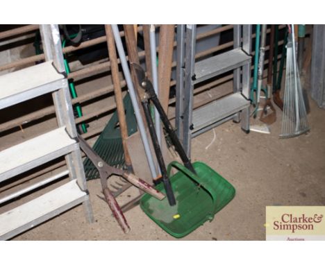 A quantity of long handled gardening tools 