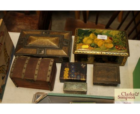 A quantity of various decorative old tins including a music box shaped as a traveling trunk