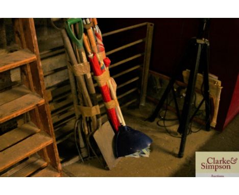 A bundle of long handled gardening tools; and a bundle of sundries 