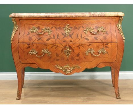 A 19th Century French kingwood bombe Commode with pink variegated marble top above two drawers with marquetry inlaid trailing