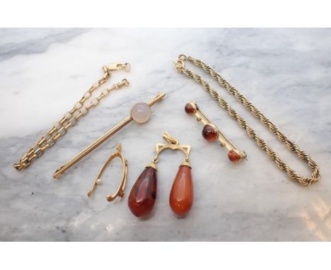 An amber type double Drop Pendant, an amber type Brooch rubover-set three cabochons, a Bar brooch set single moonstone, a Wis