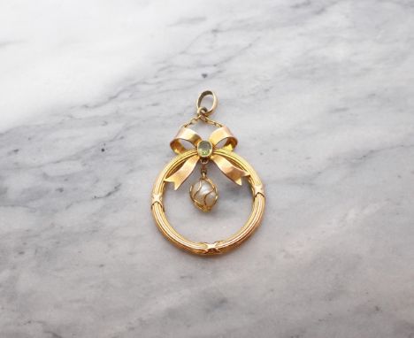 Peridot and Pearl Pendant set oval cut peridot suspended freshwater pearl within 9ct gold circular mount. Diameter 21mm. 