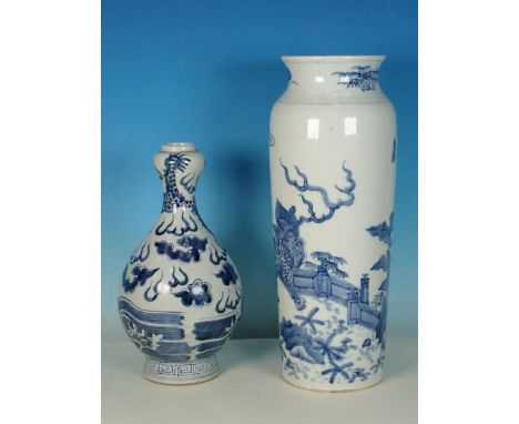 A Chinese blue and white Vase, decorated dragons and trees in a landscape, 13in H, and a Chinese blue and white baluster Vase