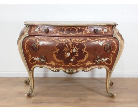 An Italian burr walnut bombe Commode with extensive floral scroll inlay, fitted three frieze drawers and raised on painted sc