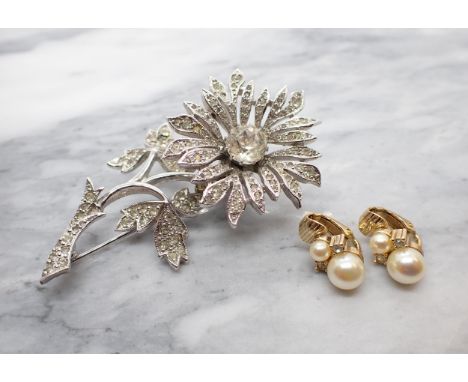 A Christian Dior Flower Spray Paste Set Brooch the flower en tremblant marked Christian Dior by Mitchel Maer. 7cm long. A Pai