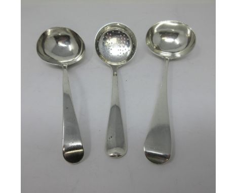 A George V silver Sifting Ladle, Hanoverian pattern with rat tail bowl, London 1912, and two Sauce Ladles, London 1889, etc 
