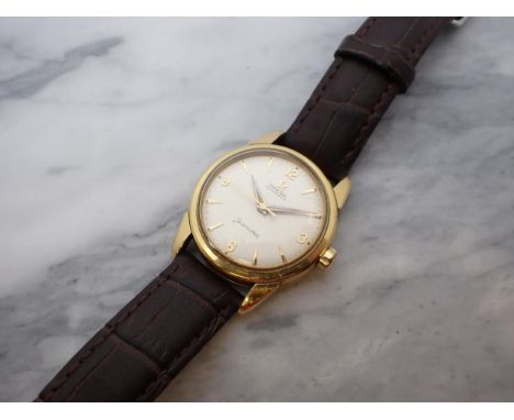 A gentleman's Omega Seamaster Automatic Wristwatch the cream dial with roman numerals at quarters, chevrons and sweep seconds