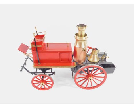 A steel and brass steam model of a Victorian horse drawn fire engine, 57cm long.