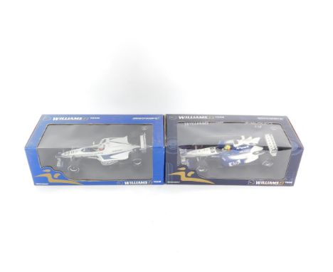 Two Minichamps scale models of racing cars, scale 1:18, comprising F1 Team, promotional show car 2000, Jenson Button, and R S