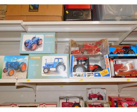 Universal Hobbies die cast models of County Superford and Ford 7000 tractors, scale 1:16, together with Ertl, Bruder and othe