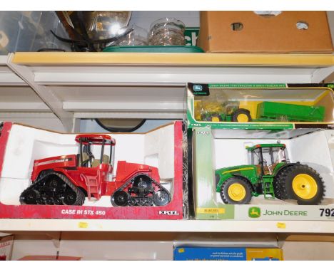 An Ertl die cast model of a Case IH STX 450, together with a John Deere 7920 tractor, collector edition, scale 1:16 and a Joh