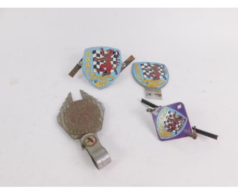 The British Automobile Racing Club three BARC car grill badges, comprising a 1912-1972 Memorial badge and two stamped badges 