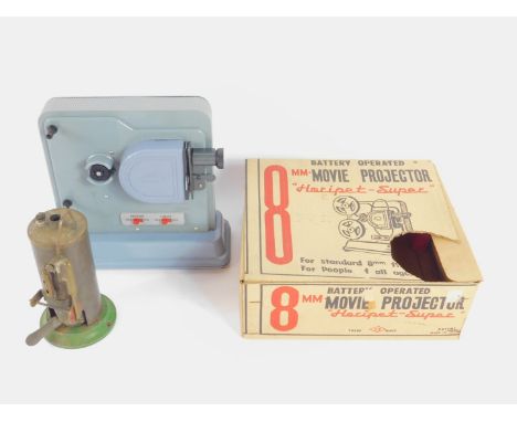 A Burnac steam engine, 18.5cm high, together with a Japanese battery operated 8mm movie projector "Horipet-super", boxed. (2)