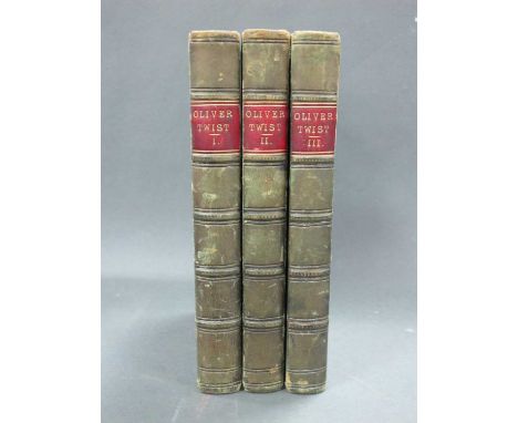 Dickens [Charles]: Oliver Twist, vols I, 2 and 3, pub by Richard Bentley, New Burlington Street, 1838, green calf and marbled