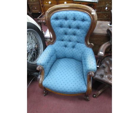 A XIX Century Mahogany Armchair, with button back upholstery, on cabriole legs.