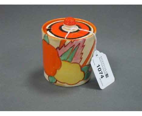 A Newport Pottery Clarice Cliff Fantasque 'Bizarre' Fruitburst pattern Preserve Pot, rim repair, with associated lid, printed
