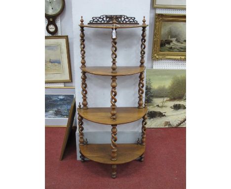 A XIX Century Rosewood What-Not, with pierced back, four bow fronted shelves on barley twist supports, 110cm high, 52cm wide.