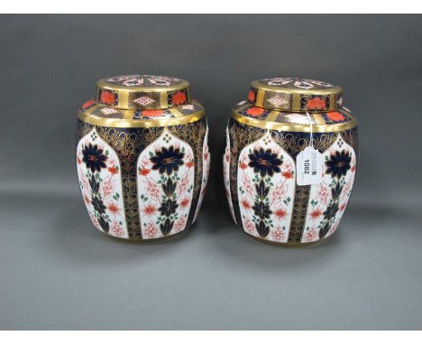 A Pair of Royal Crown Derby Porcelain Ginger Jars and Covers, decorated in Imari pattern 1128, date codes for 1987, 22cm high