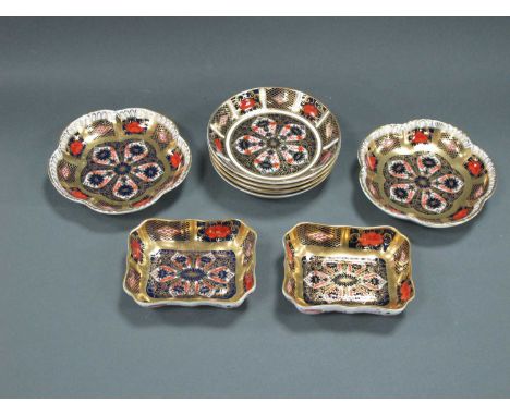 A Collection of Eight Royal Crown Derby Dishes, decorated in Imari pattern 1128, comprising: two shaped rectangular, four cir