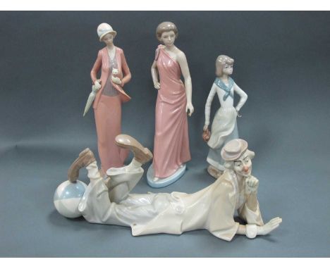 A Lladro Figure 'Resting Down', 37cm long; two Nao figures and a Casades figure:- One Tray