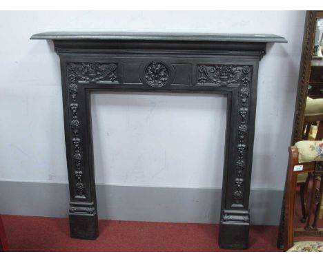 A XIX Century Cast Iron Fire Surround, with swag and foliate decoration, 110cm high, 108cm wide.