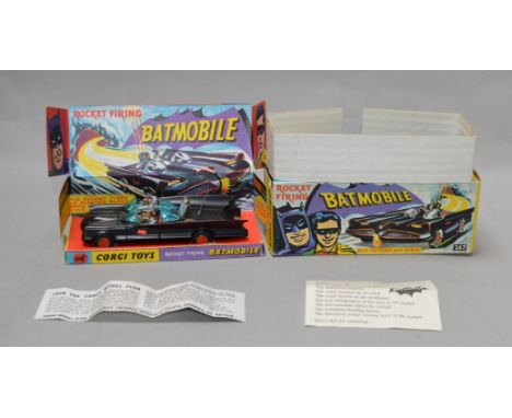 A boxed Corgi Toys 267 'Batmobile', scarce variation in matt black with red 'Bat' hubs, VG, with opened 'Batman Instructions'