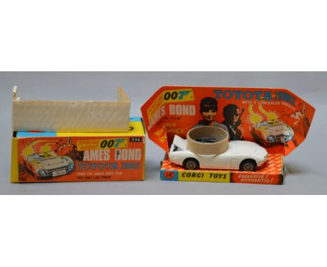 A boxed Corgi Toys 336 James Bond Toyota 2000GT in white, together with sealed 'Secret Instructions' envelope. Model appears 