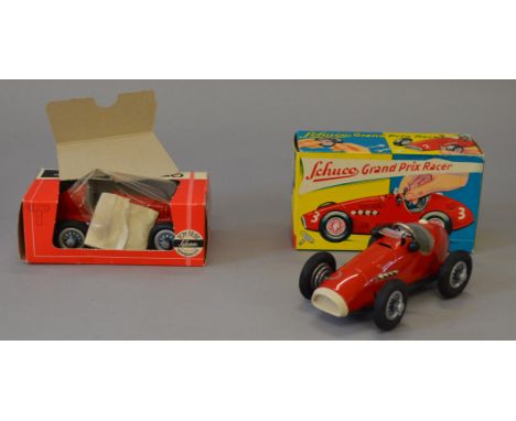 A boxed Schuco 1070 tinplate clockwork Grand Prix Racer RN '2', and a 1050 'Studio' Mercedes Grand Prix Racer RN '5',both app