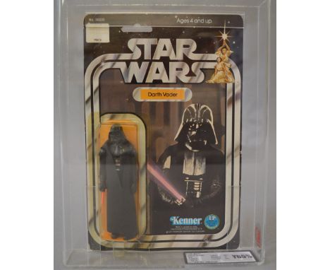 Kenner Star Wars Darth Vader 3 3/4 action figure on a 12 B back card. UKG graded Y65% (C60% B75% F85%).