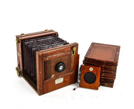 A 19th century mahogany Meagher whole plate Tailboard camera, with Anastigmat wide angle lens, 6 double dark slide plate hold