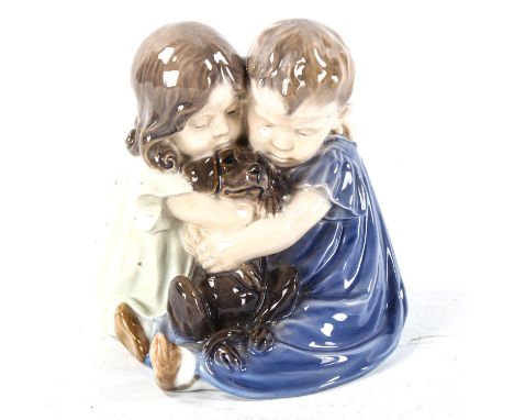 Royal Copenhagen porcelain group, 2 children with a puppy, model no, 707, height 15cm 