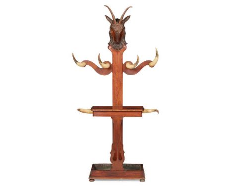 BLACK FOREST HORN MOUNTED HALL STAND 19TH CENTURY the centre support surmounted by a carved goat's head with horns, over twin