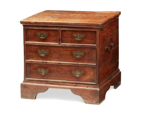 GEORGE I WALNUT BOX COMMODE EARLY 18TH CENTURY of small size in the form of a chest of drawer with two short and two long dum
