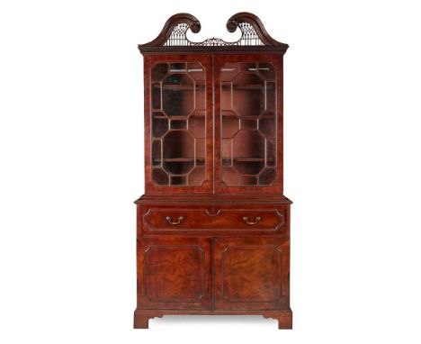 EARLY GEORGE III MAHOGANY BUREAU BOOKCASE, IN THE MANNER OF THOMAS CHIPPENDALE MID 18TH CENTURY the moulded swan neck pedimen