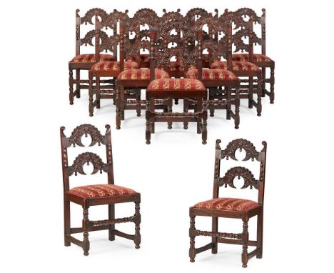 SET OF TWELVE CARVED OAK DINING CHAIRS LATE 19TH CENTURY, IN THE 17TH CENTURY STYLE with floral carved crescent shaped cross-