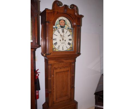 George III Oak and Mahogany Longcase Clock with boxwood and ebony inlay, having painted round arch dial with moonphase and su