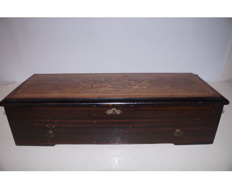 Large 19th Century Music box with 12 Airs in inlaid Rosewood case. Condition report: Working Condition, Comb has no broken te