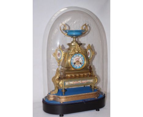 French Brass Ormolu clock with painted panels  striking on a bell with original glass dome. Clock without base- 44cm 