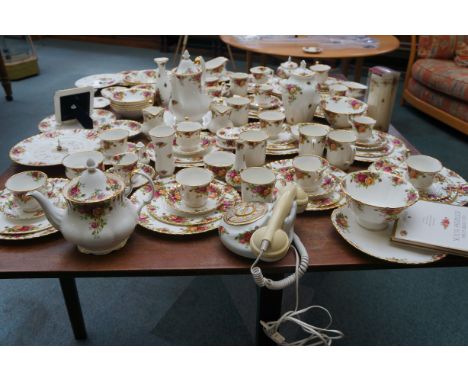 Royal Albert Country Rose dinner service and others to include, clocks, vases and picture frames etc (approximately 120 piece